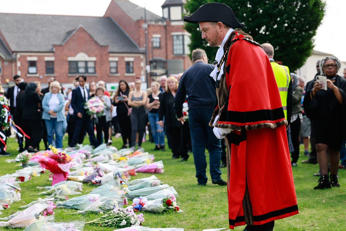 The Mayor of Sandwell Councillor Richard Jones views the tributes to the Queen. Photo: Ben Gregory-Ring