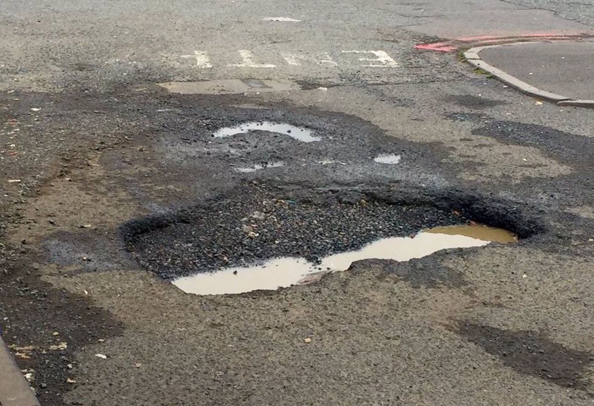 Sandwell Council pays £65k compensation over pothole injuries | Express ...