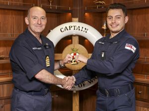 SLt James Owen gains promotion in a presentation from Captain Stephen Higham OBE RN on board HMS Prince of Wales.
