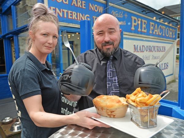 Kelly Colledge brings James Vukmirovic his Tyson Fury pie at Mad O'Rourkes Pie Factory