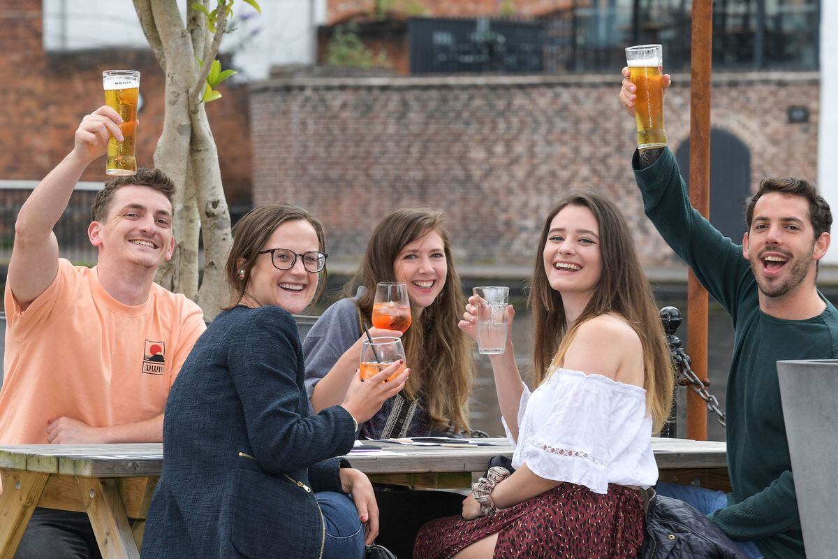 Pubgoers enjoyed a cold pint in the beer garden at the Canal house in Birmingham. Picture by: Snapper SK
