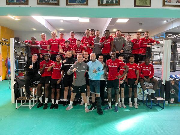 Michael Flynn and his Saddlers squad at Wolverhampton Boxing Club with head coach Richie Carter