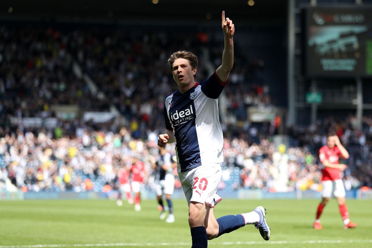 Adam Reach of West Bromwich Albion celebrates after scoring a goal to make it 2-0 during the Sky Bet Championship match between West Bromwich Albion and Barnsley at The Hawthorns on May 7, 2022 in West Bromwich, England. (Photo by Adam Fradgley/West Bromwich Albion FC via Getty Images).