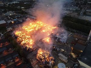 West Midlands Fire Service firefighters tackling a blaze involving thousands of tons of paper and cardboard at a Smurfit Kappa storage yard and recycling plant in Birmingham. 