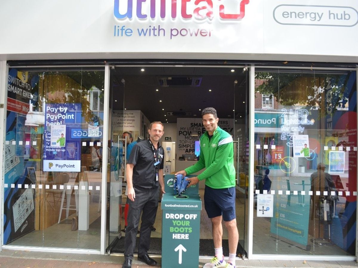 David James places a pair of boots into the Football Rebooted box at the local Utilita Energy Hub