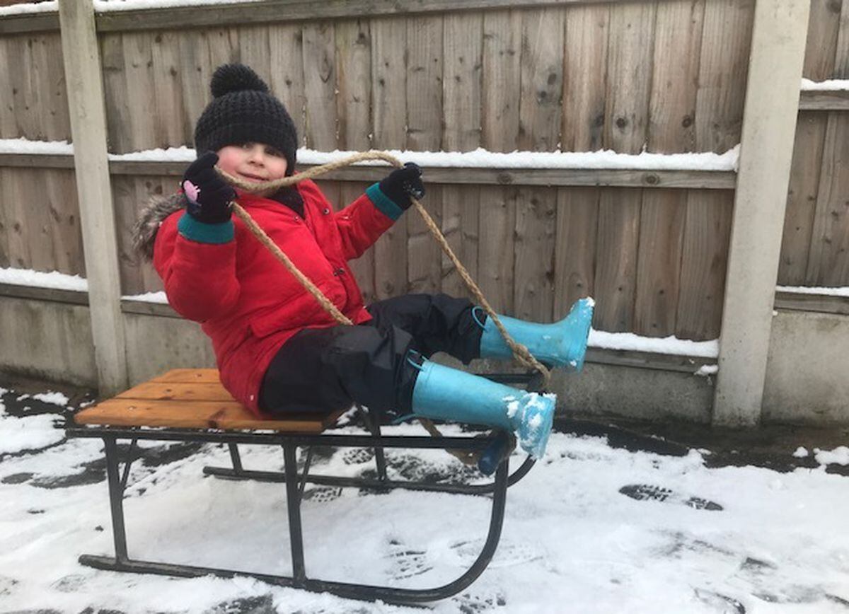 Spencer Gallear, aged 4, having his first go on a sledge his mother Kelly Hartshorne used to have as a child. They made their way up Churchill in Bentley