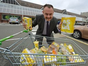Mark Andrews with a trolley full of Just Essential products at Asda – costing just £22