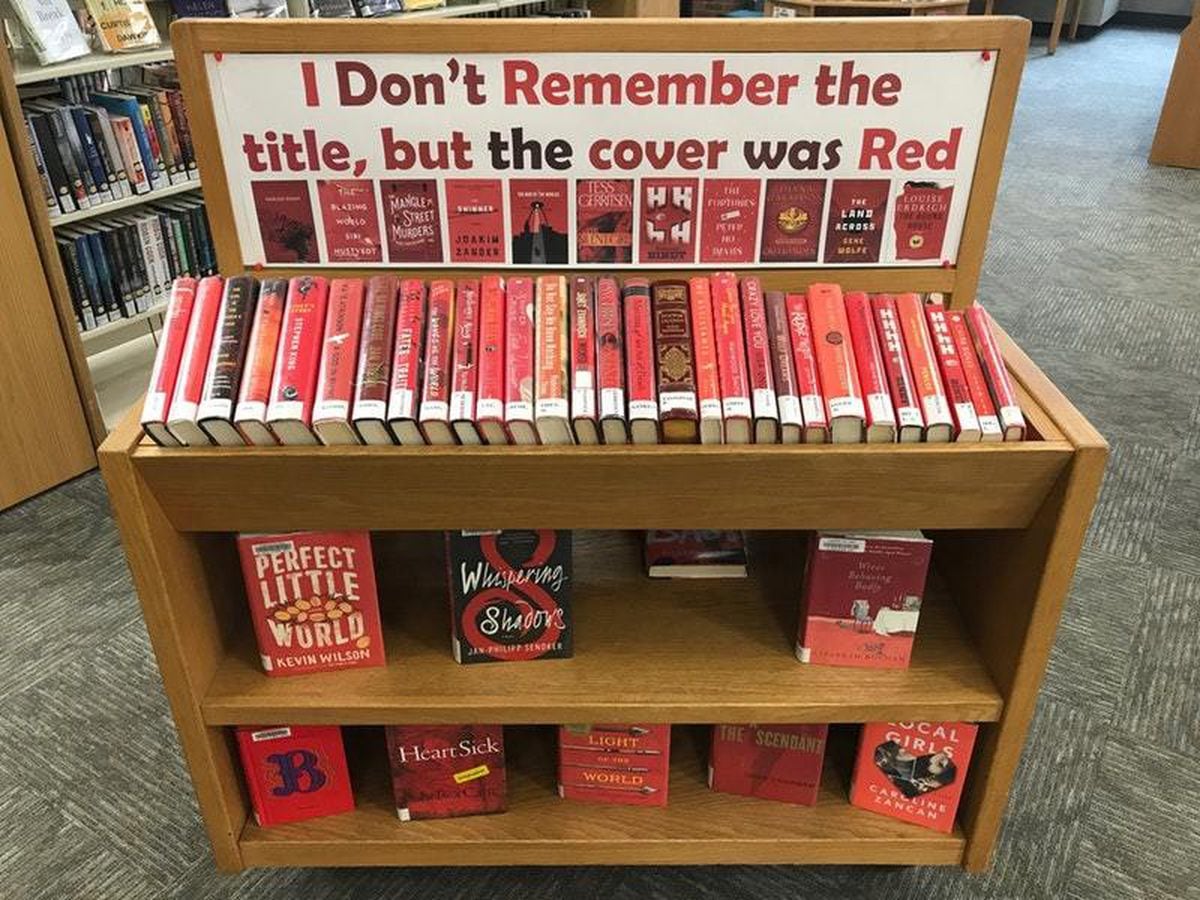 The library shelf with a sign reading Ã¢ÂÂI donÃ¢ÂÂt remember the title, but the cover was redÃ¢ÂÂ (@Metafrantic/PA)