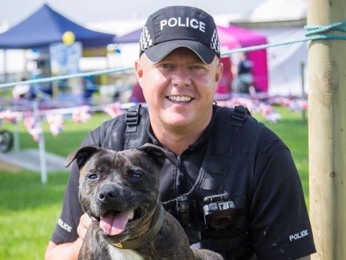 PD Cooper with his former handler and now owner, PC Tim Moss