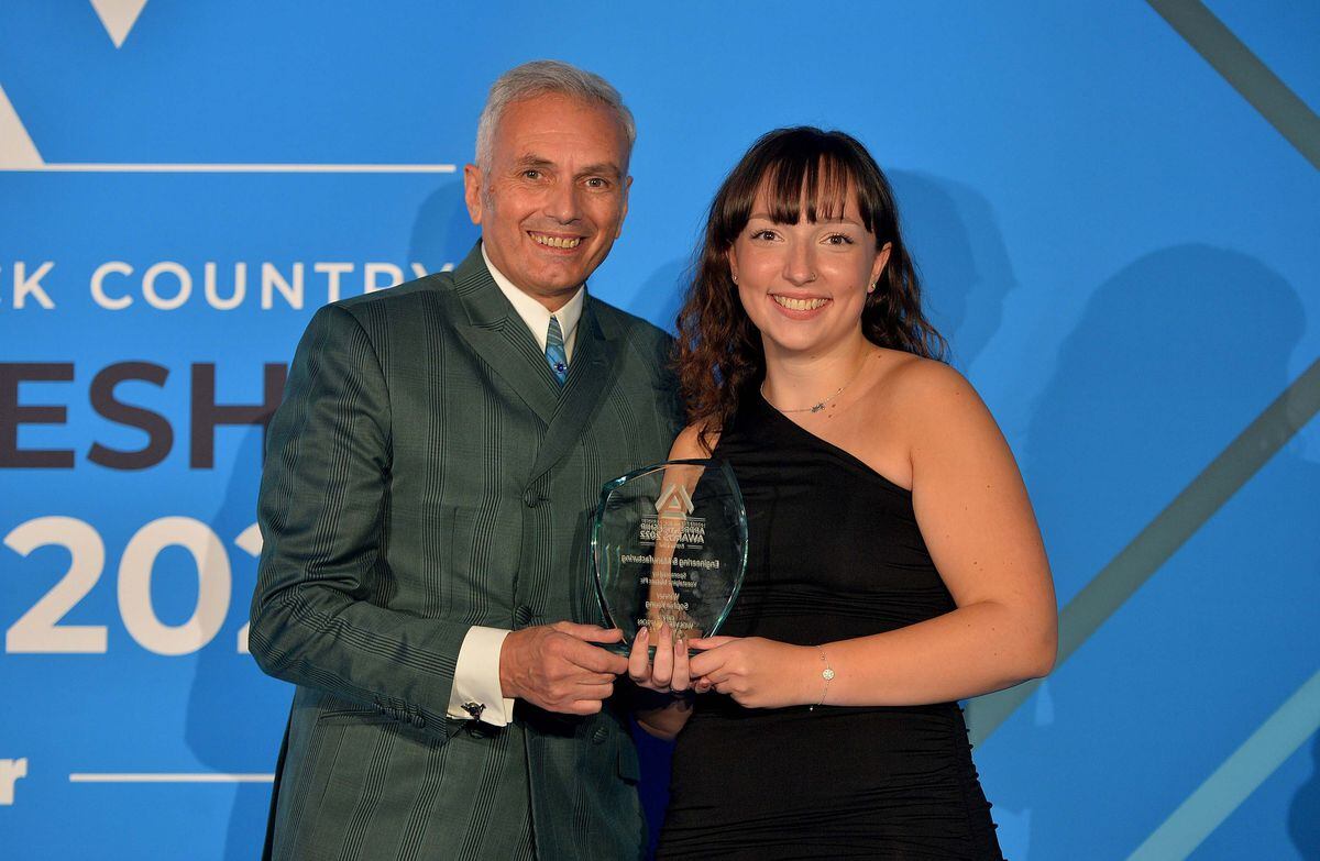 Engineering and manufacturing winner Sophie Young receives her award