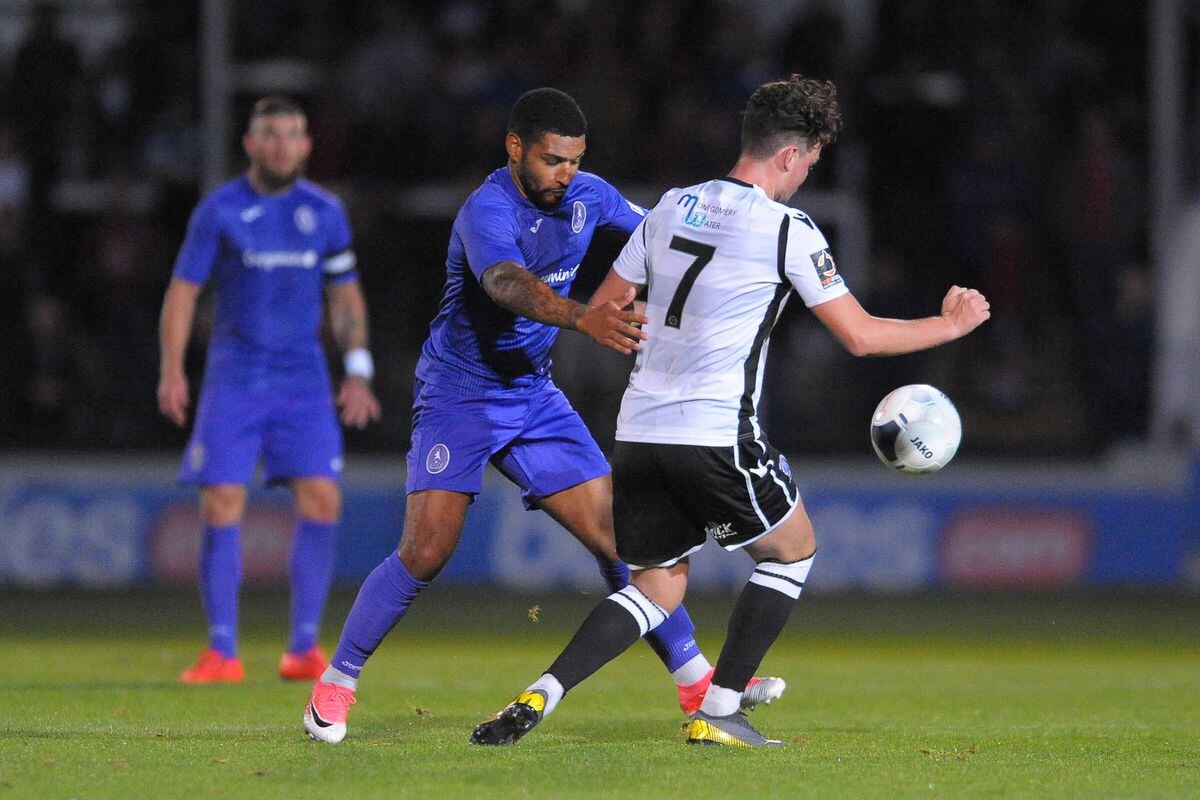 TELFORD COPYRIGHT MIKE SHERIDAN Ellis Deeney of Telford battles for the ball with Tom Owen-Evans of Hereford during the National League North fixture between Hereford FC and AFC Telford United at Edgar Street, Hereford on Tuesday, August 13, 2019..Picture credit: Mike Sheridan..MS201920-009.