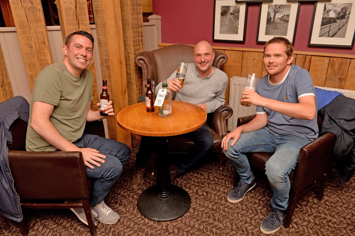 Paul Gittos, Stuart Turner and Lance Pritchard enjoy a drink at the Oddfellows in Compton.