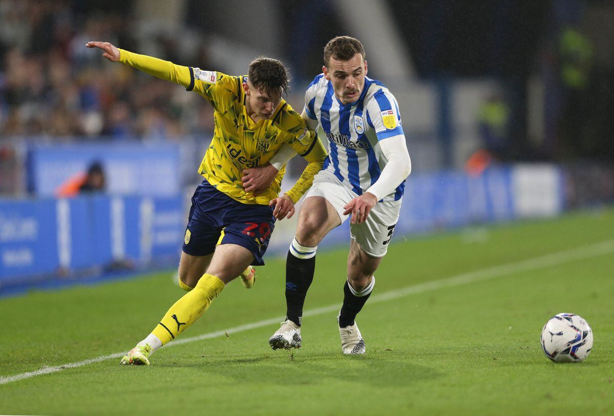 West Bromwich Albion's Taylor Gardner-Hickman and Huddersfield Town's Harry Toffolo