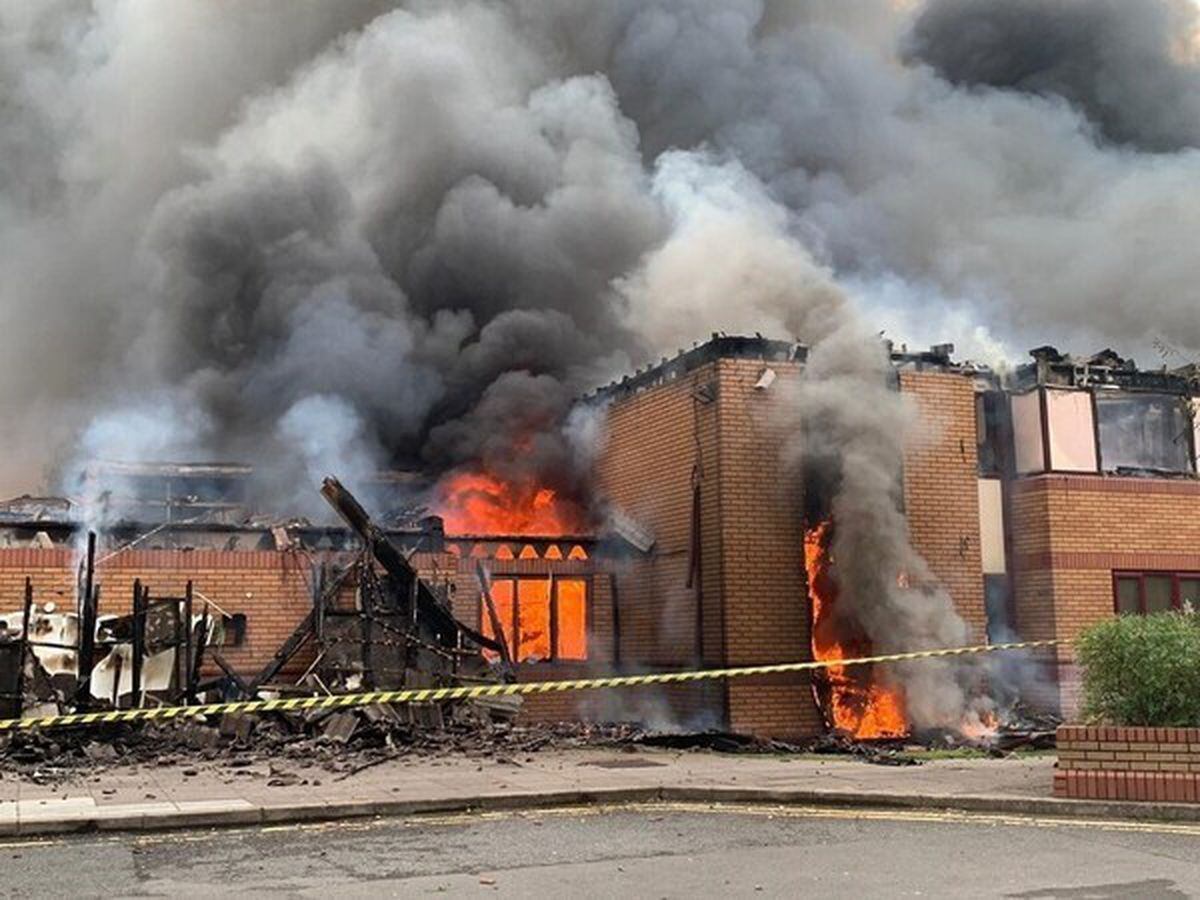 The hotel on fire. Photo: John Kennett/WMFS