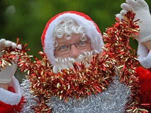 Arthur Roberts dresses up as Father Christmas