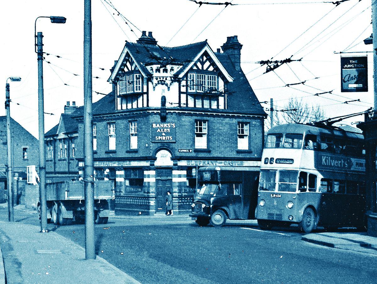 Trolleybuses were a regular sight outside the pub in the mid-20th century 