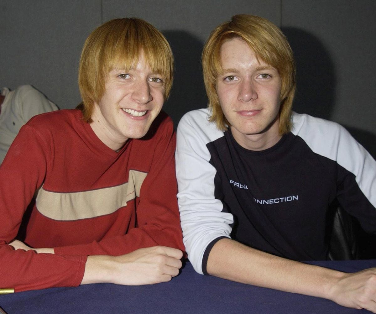 James and Oliver Phelps during a signing session at the Collectormania 4 film festival and collector's fair in 2003 