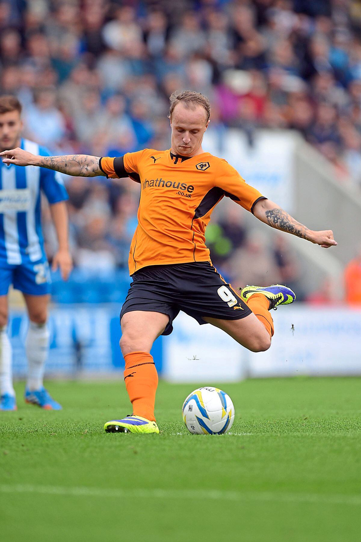 Leigh Griffiths of Wolverhampton Wanderers scores from the penalty spot