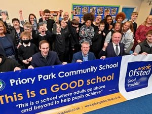 Dudley's Priory Park Community School head Stuart Playford, Councillor Kieran Casey and MP Marco Longhi, celebrate with staff and pupils