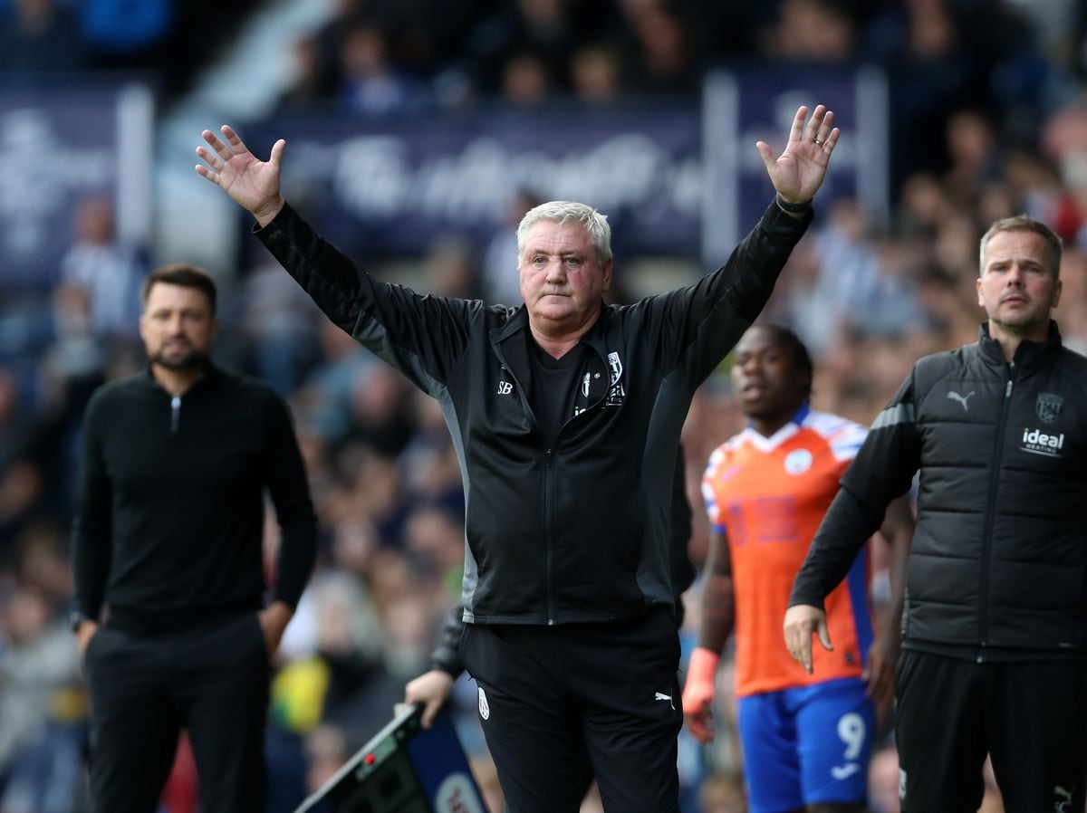 WEST BROMWICH, ENGLAND - OCTOBER 01: Steve Bruce Head Coach / Manager of West Bromwich Albion reacts with both arms held aloft after a penalty claim that wasn't given during the Sky Bet Championship between West Bromwich Albion and Swansea City at The Hawthorns on October 1, 2022 in West Bromwich, United Kingdom. (Photo by Adam Fradgley/West Bromwich Albion FC via Getty Images).