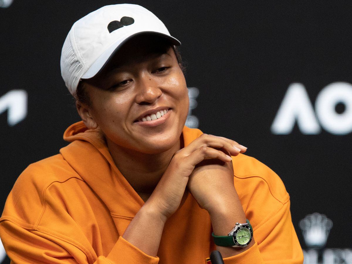 Naomi Osaka smiles during her press conference on Saturday