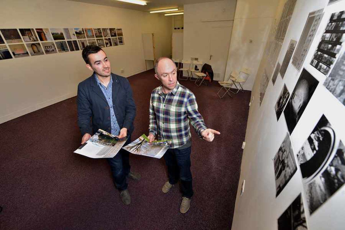 Jack shows some of his work to Tom Bennett, Creative Director at National Trust's Croome Park