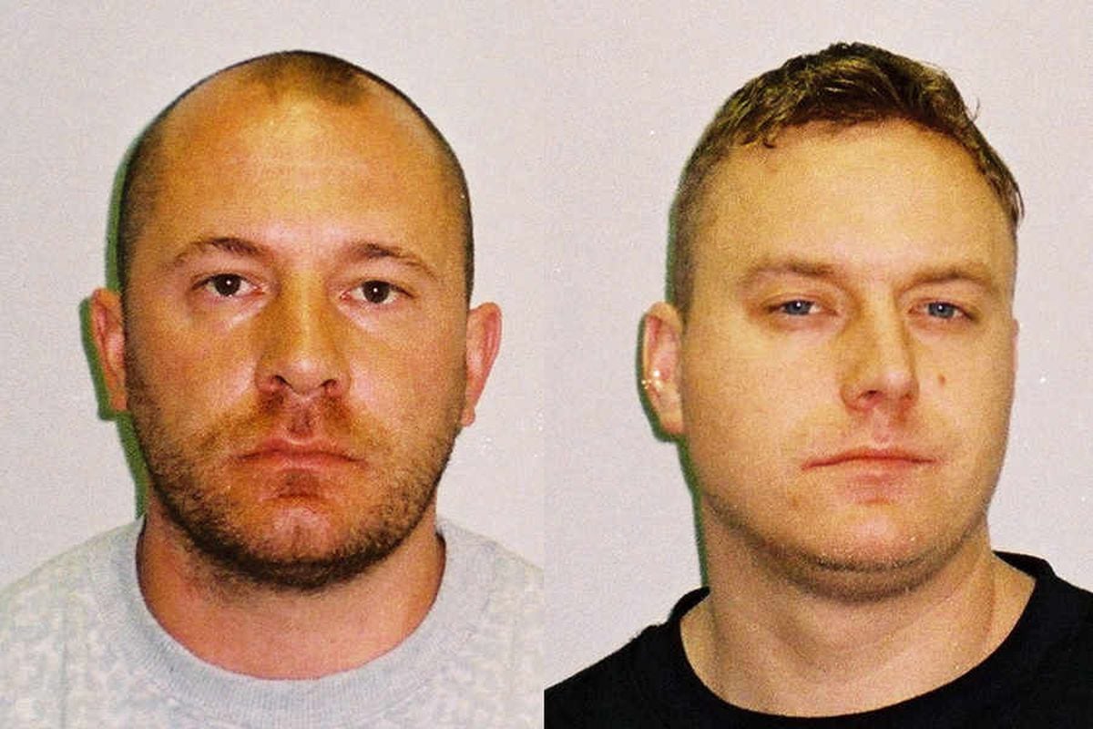 Prison terms cut for armed robbery pair