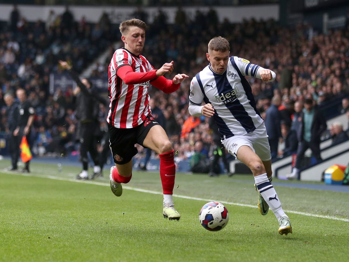 Dan Neil of Sunderland and Conor Townsend (Photo by Adam Fradgley/West Bromwich Albion FC via Getty Images).