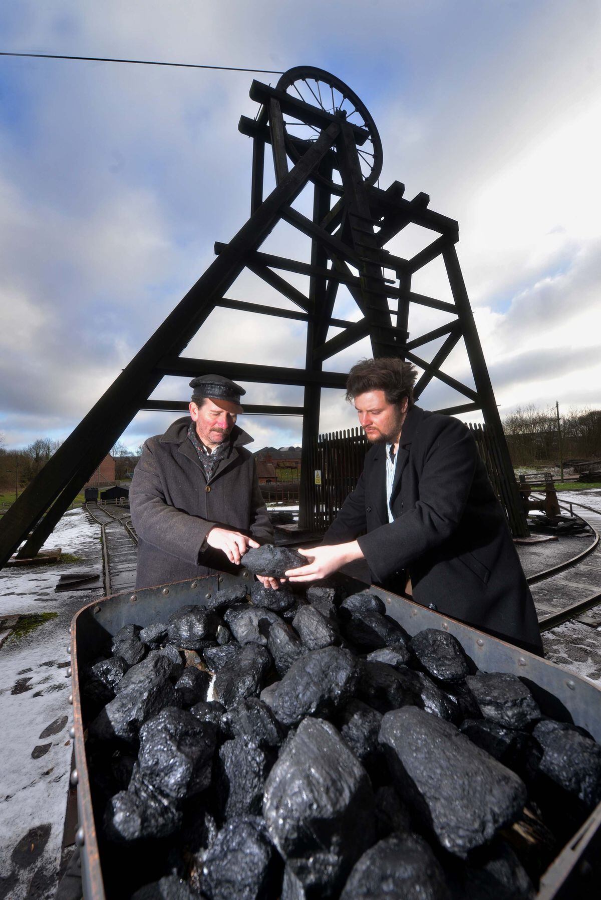 Slim and Darren look over some of the coal