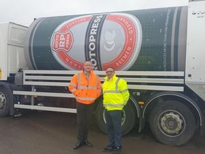 Tony Marston, contract manager at Serco (left), and Councillor Zahoor Ahmed with the Rotopress vehicle