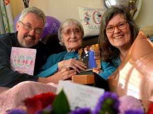 Marion Scarratt, celebrating her 100th birthday with her son John Scarratt, 65, and her daughter Carolyn Gough, 71