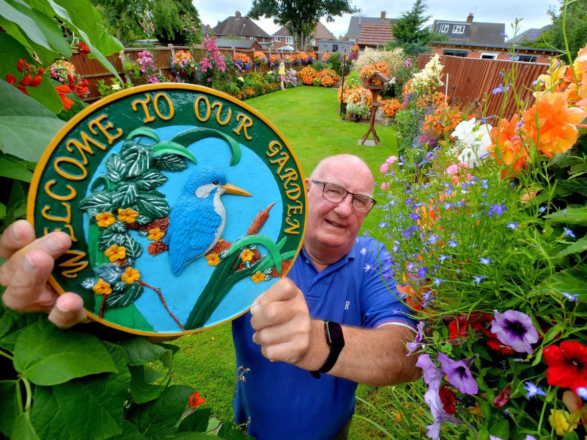 Dennis Amos 77, with his award winning garden that has been helping him as he battles cancer