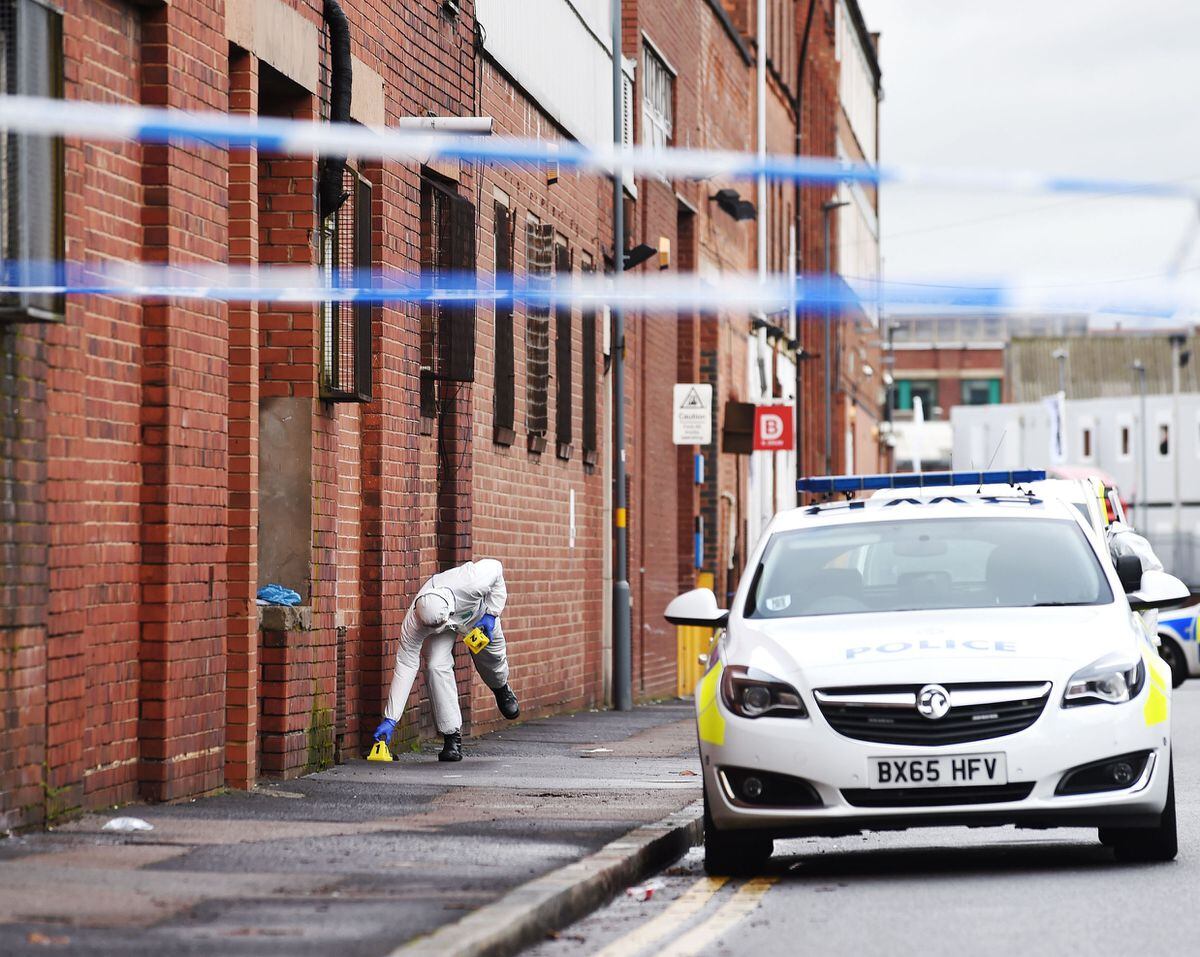 Police forensic officers at the scene in Rea Street, Digbeth