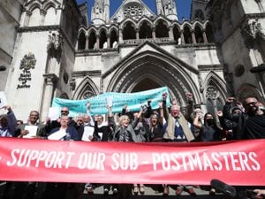 Former sub-postmasters outside the Royal Courts of Justice after their court win (Yui Mok/PA)