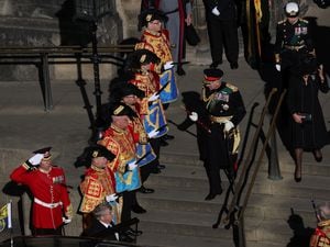 Philip Tibbetts (top left) in uniform as King Charles II leaves St Giles' Cathedral in Edinburgh