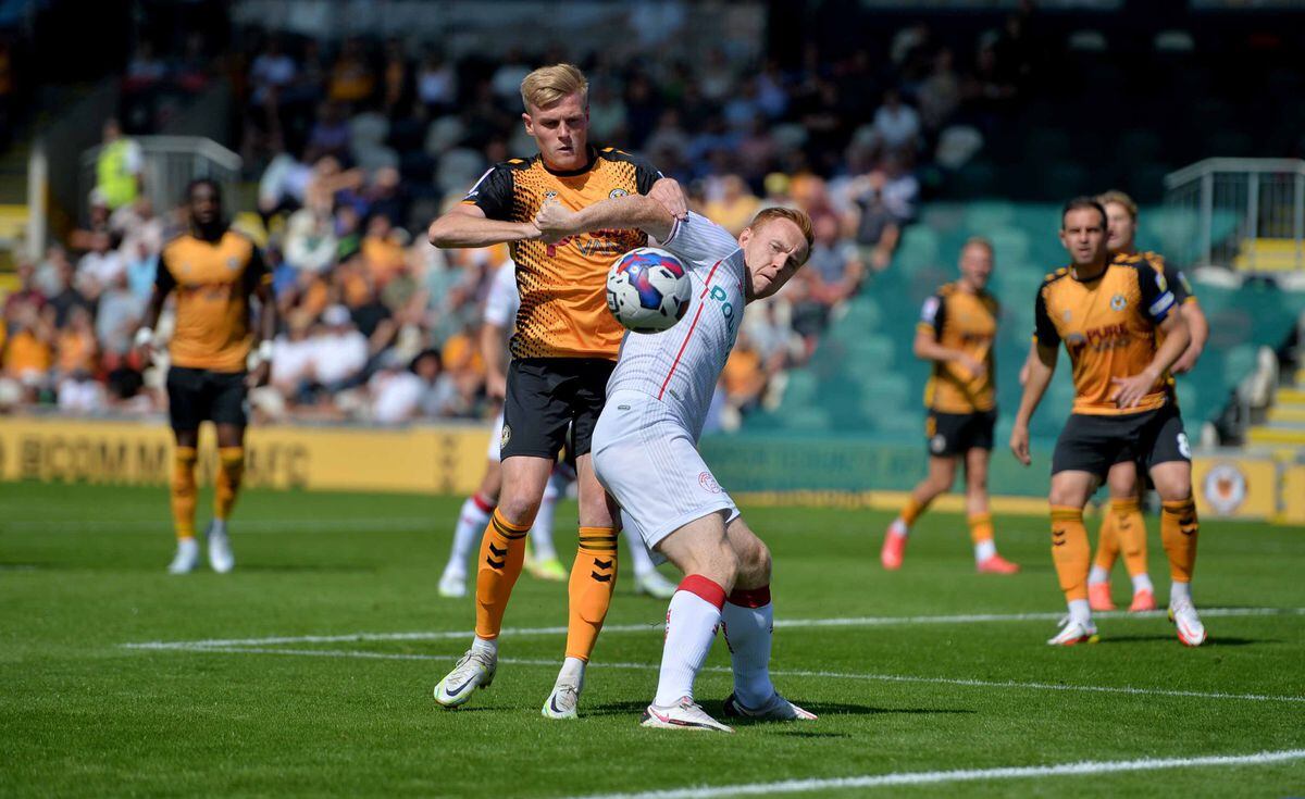 Walsall's Danny Johnson and Newport's Will Evans