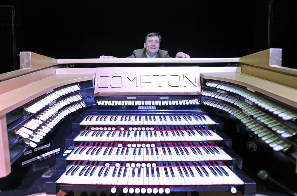 Donald McKenzie with the organ console, which has not been scrapped