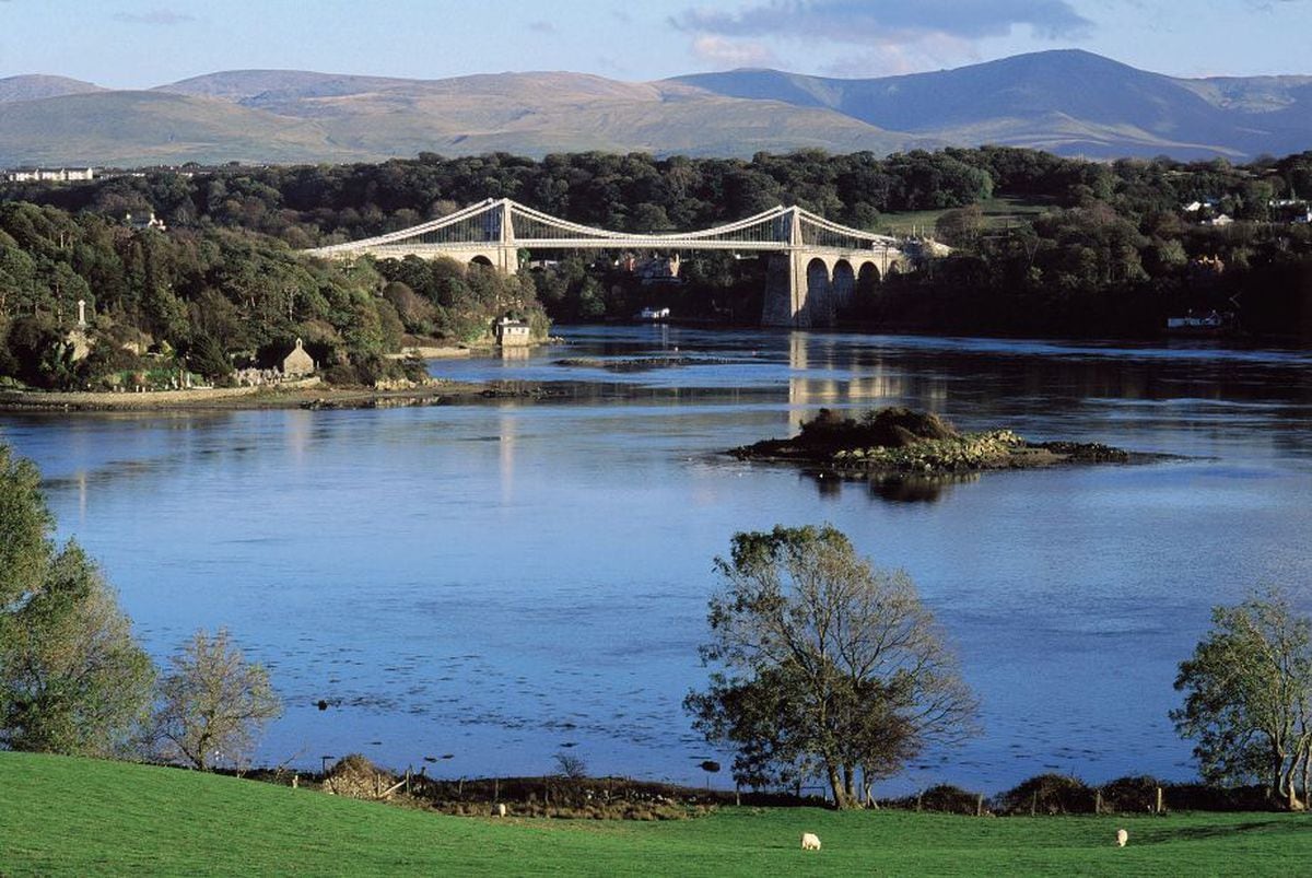Spectacular bridge, spectacular setting – the Menai Bridge connects the island of Anglesey to mainland Britain.