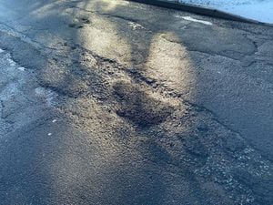 The poor condition of the road surface in Amos Lane, Wednesfield, Wolverhampton