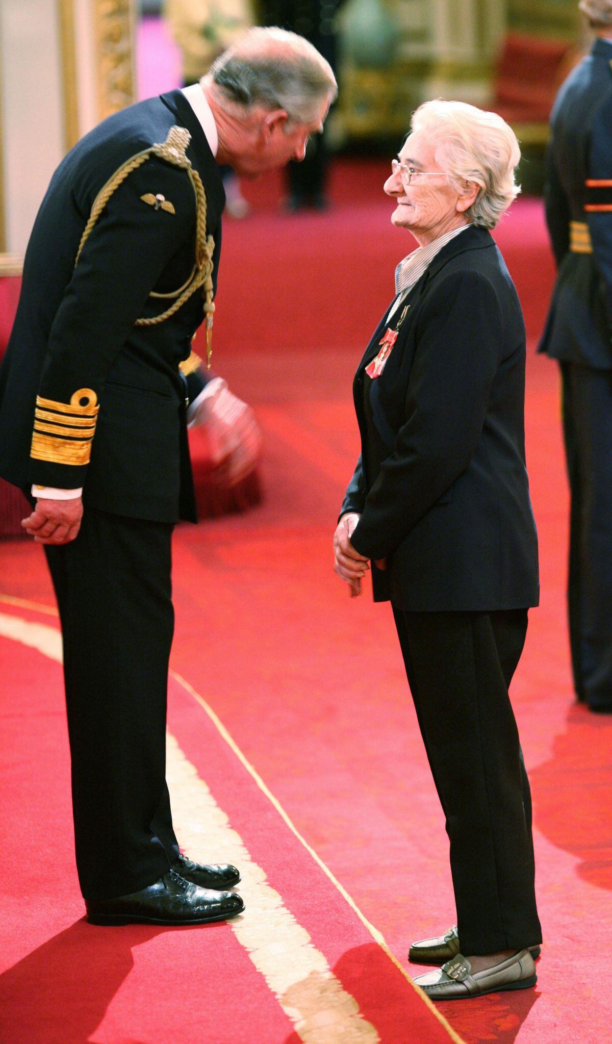 Ann Nightingale at Buckingham Palace receiving her Member of the British Empire (MBE) medal from the Prince of Wales - now King Charles III. Photo: Lewis Whyld/PA Wire.