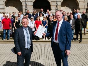Over 120 retailers have signed a petition called for free parking in Stafford Town Centre. From left: Mike Smith (chief executive of Stafford Railway Building Society) and Councillor Jonathan Price