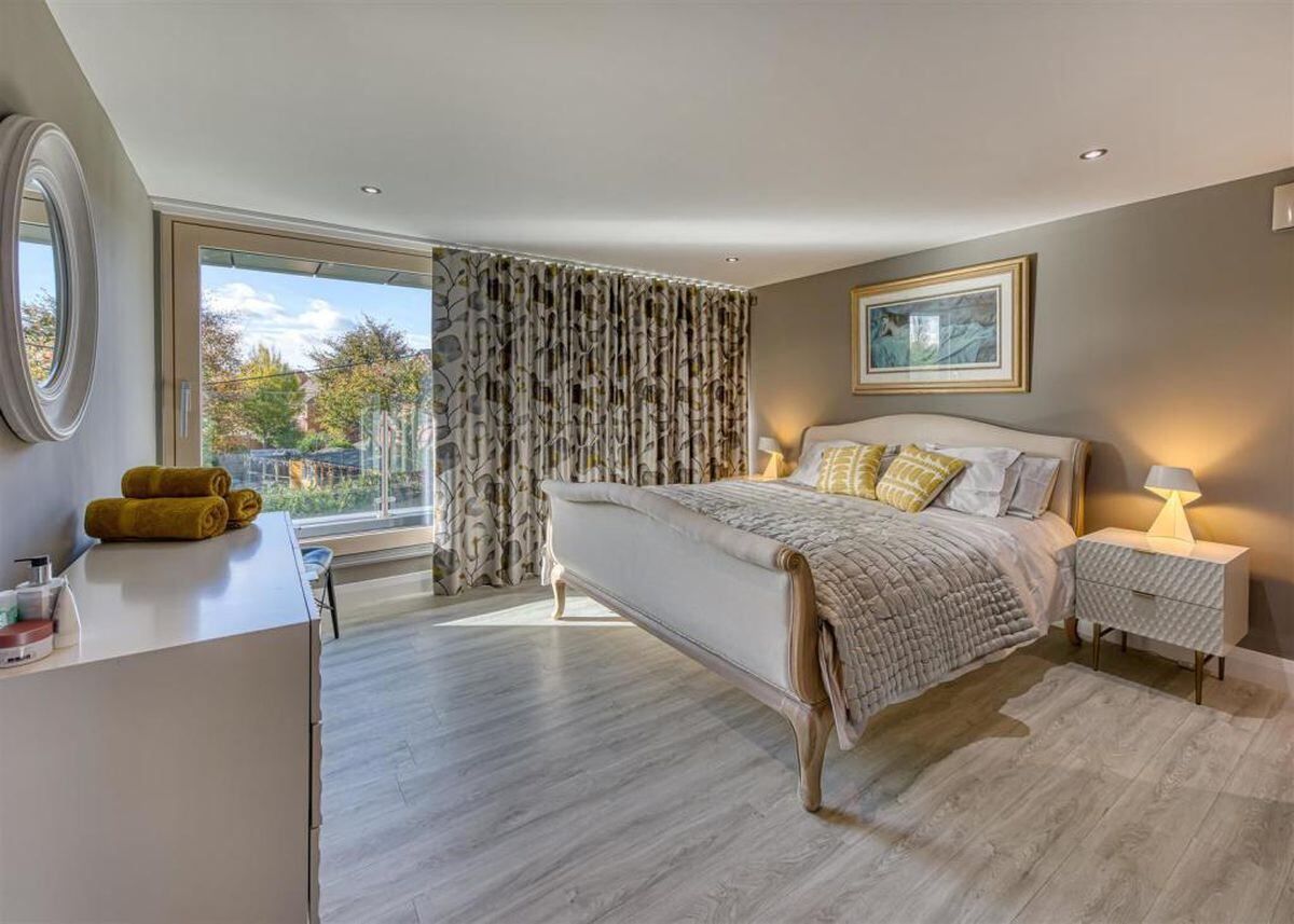 A second bedroom with ambient lighting. Photo: Berriman Eaton.