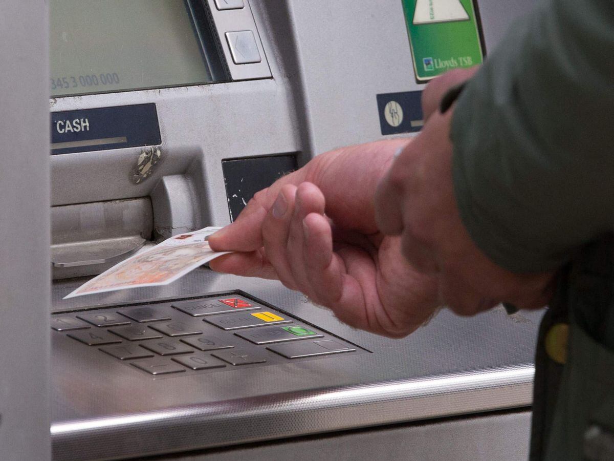 Man withdrawing money from ATM