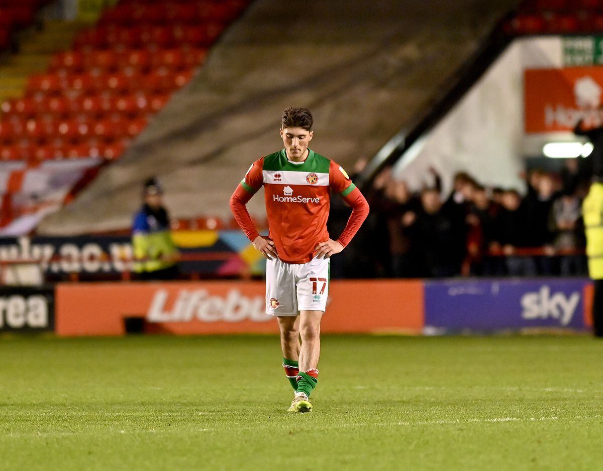 SPORT COPYRIGHT MNA MEDIA TIM THURSFIELD 22/01/22.WALSALL V EXETER.A dejected Jack Earing at the final whistle....