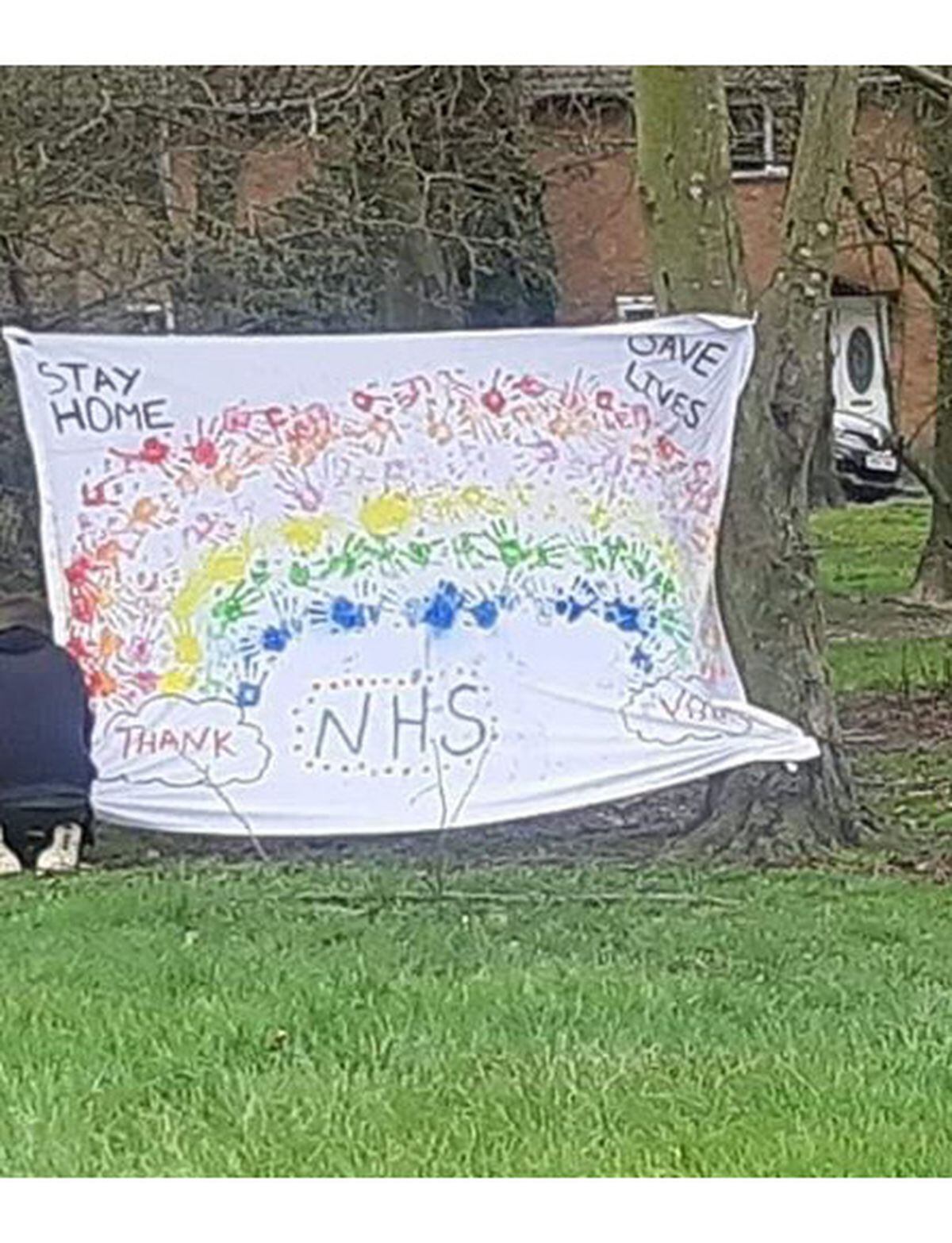 Jade Baker, her partner Mikey and their three children Freya, Finley and Amelia made this banner to put up in their street in Willenhall