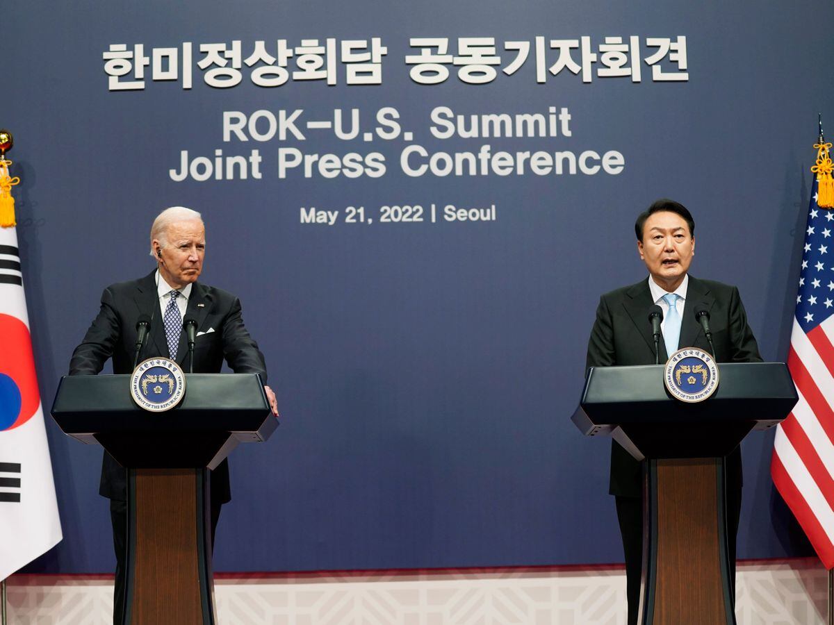 US President Joe Biden listens to South Korean President Yoon Suk Yeol speak during a news conference at the PeopleÃ¢ÂÂs House inside the Ministry of National Defence in Seoul