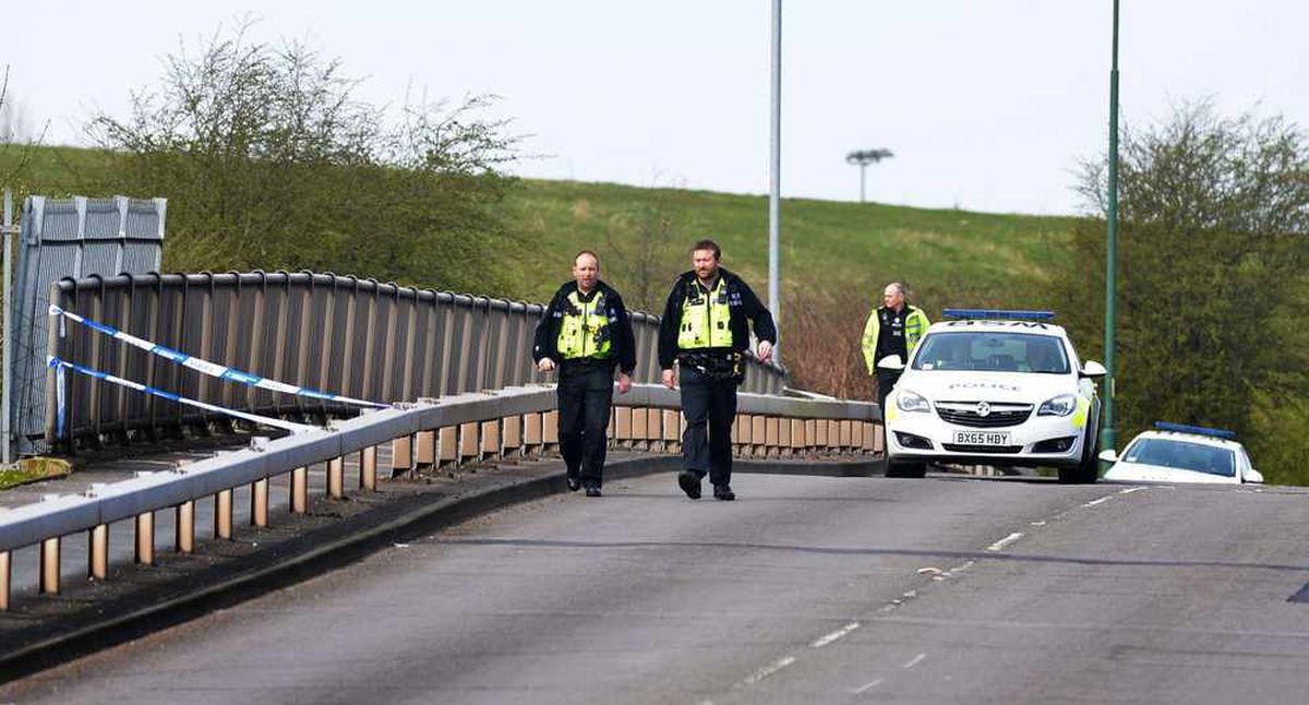 Police on the bridge after the suicide of David Stokes