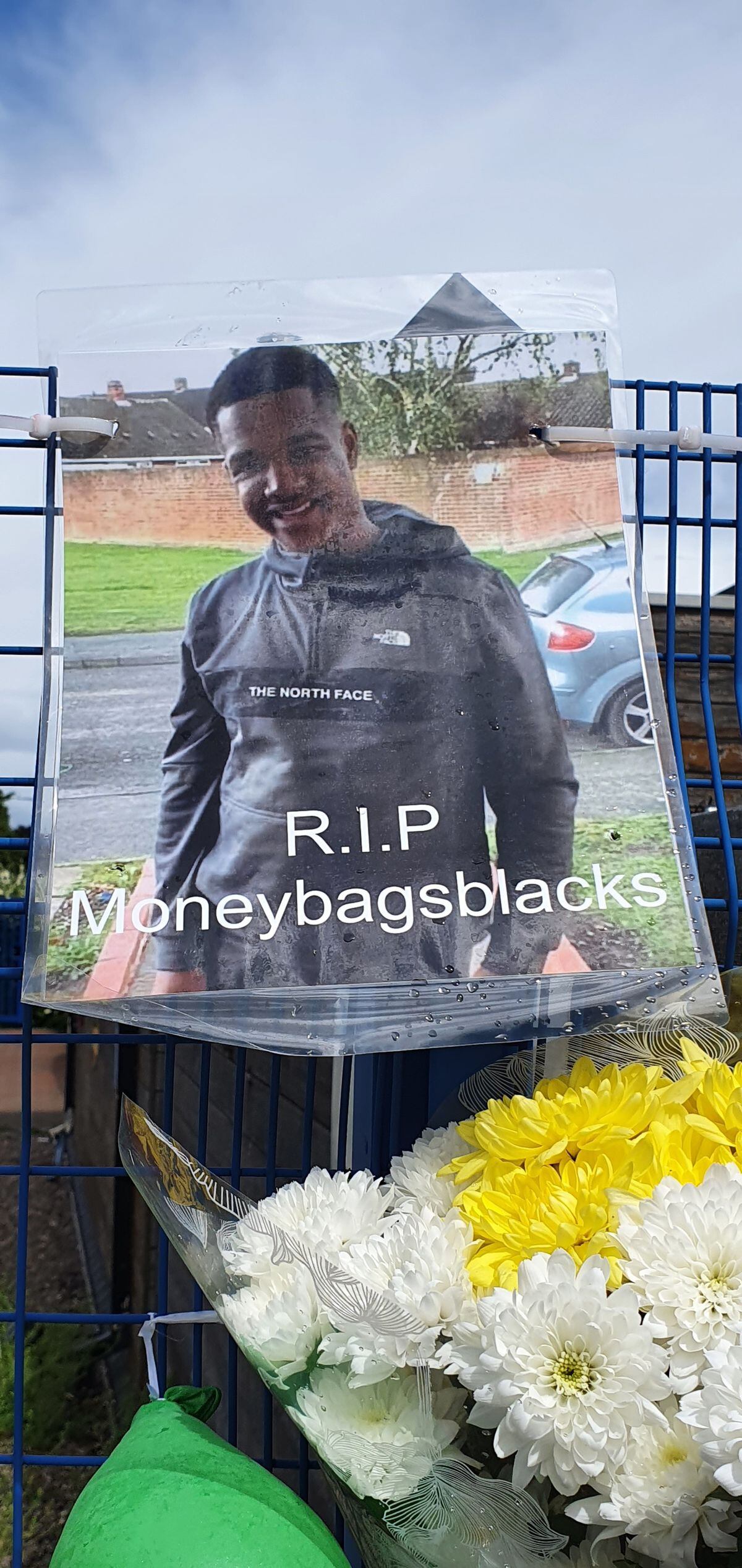Images of the 21-year-old, known locally as Blacks, were put up in tribute