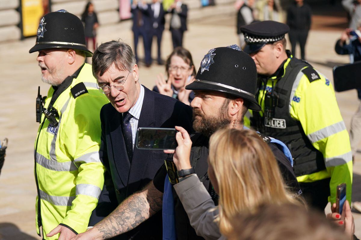 Business Secretary Jacob Rees-Mog was given a police escort into the venue [Jacob King/PA Wire]