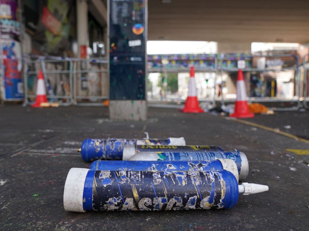 Nitrous oxide gas canisters littering a street